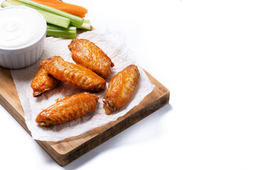 Buffalo spicy chicken wings with cayenne pepper sauce isolated on white background. Copy space