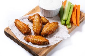 Buffalo spicy chicken wings with cayenne pepper sauce isolated on white background