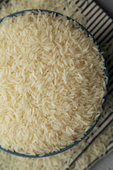 Dry Jasmine Rice in a Bowl, top view.