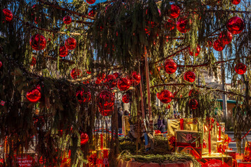 Winter holidays in Italy. Beautiful New Year tree with gifts in the center of Bergamo, Italy