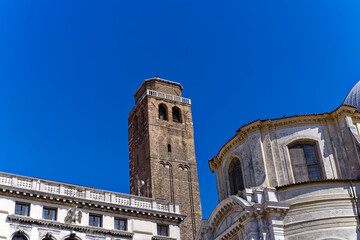 Scenic view of the old town of Venice with church tower of church Santi Geremia e Lucia and historic buildings on a cloudy summer day. Photo taken August 6th, 2023, Venice, Italy.