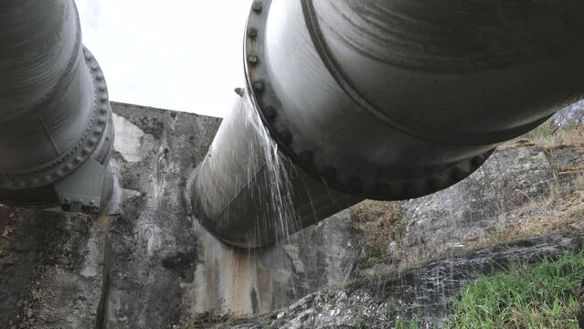 Water leaking from huge old pipeline