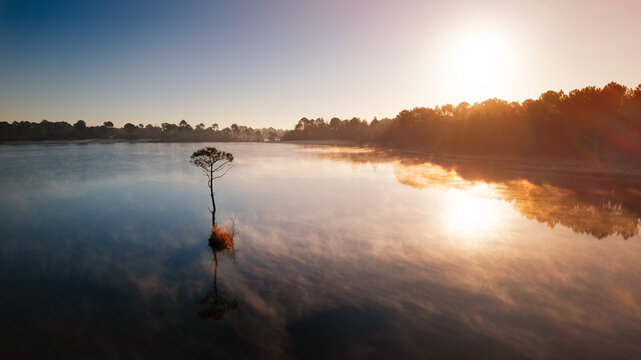 Sunrise sunlight above Lake Hostens with winter light