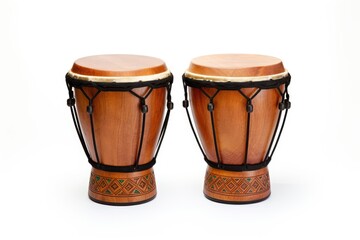 Two wooden drums with black straps. Bongo drums isolated on a white background