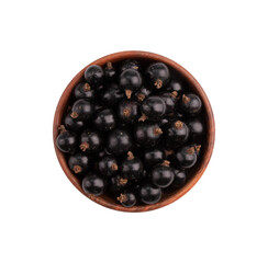 black currant in wooden bowl isolated