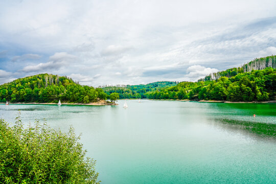 View from the Aggertalsperre in Oberbergisches Land. Landscape by the lake in the Agger valley in North Rhine-Westphalia.
