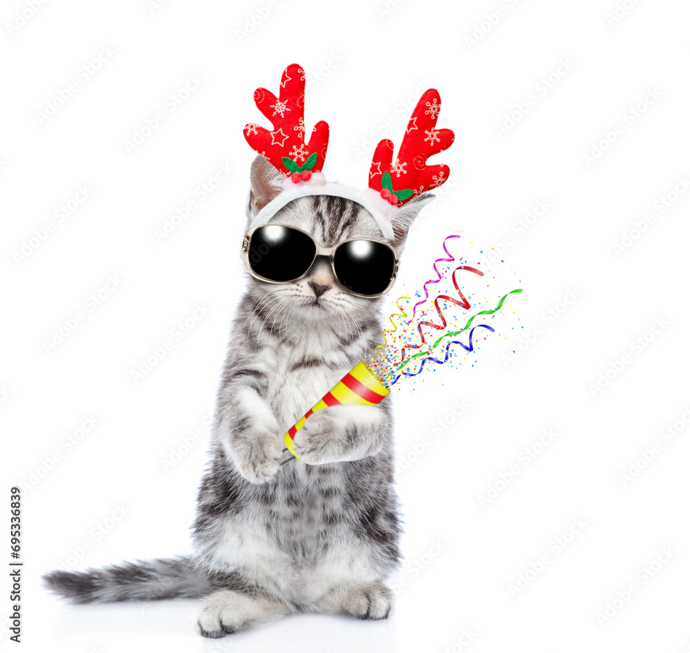Poster cute kitten dressed like santa claus reindeer rudolf with sunglasses holds exploding firecracker. is