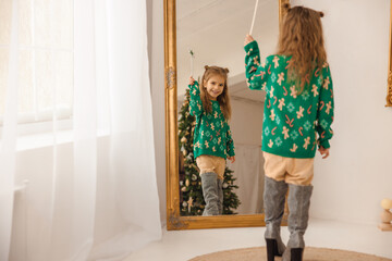 Cute long-haired girl having fun playing a good fairy