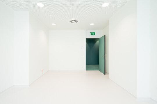 White room with open door in hospital