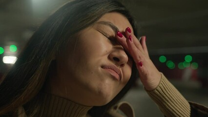 Close up woman face Asian chinese korean japanese ethnic girl upset anxious female feeling bad headache pain negative emotion desperate disappointed lost job relationship problem stress health care