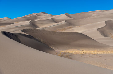 Fototapeta na wymiar Wide view of high sand dunes, Great Sand Dunes National Park, Preserve Colorado, USA