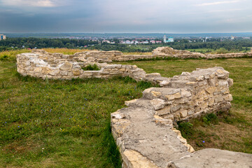 One of the towers of the ancient fortress of the ancient Bulgarian Yelabuga settlement and view of...