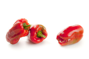 Three red bell pepper isolated on white background with clipping path. .
