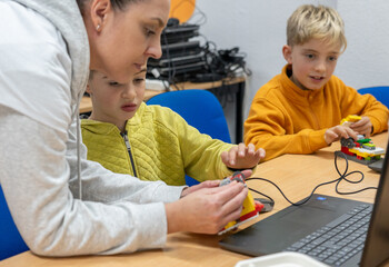 Robotics class for children with a teacher