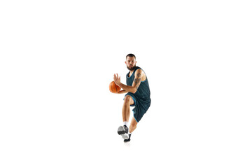 Fototapeta na wymiar Professional basketball player in uniform, engaged in focused training session before match against clean white background.