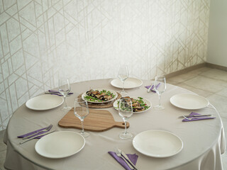 a fully set table for lunch time in the house