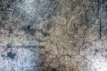 Grunge concrete wall with cracks and scratches. Abstract background for texture.