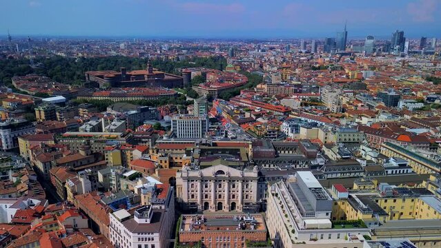 Aerial view of the Borsa Piazza Affari. Krishi houses in the city. Attractions for tourists. A crisis. Statue of the middle finger on the hand. Finance. Architecture. Italy, Milan, 12.12.2023