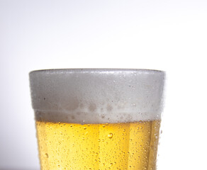 Glass of light beer on typical brazilian cup (americano long drink).