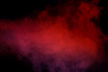 Orange and red steam on a black background.
