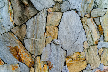Texture of a stone wall. Old castle stone wall texture background. Stone wall as a background or texture. Part of a stone wall, for background or texture