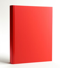 Red book standing on white surface
