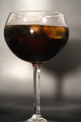 A photo of a cocktail in a glass