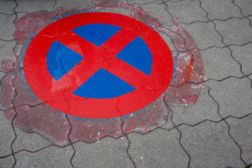 No stopping sign painted on asphalt