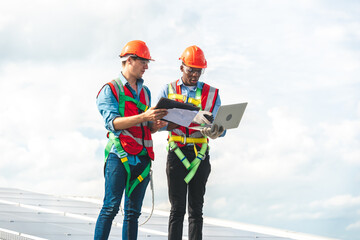 Engineer technician team using laptop checking and operating system on rooftop of plant farm,...