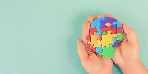 ASD autism spectrum disorder, deficits in social communication and interaction, mind with  colorful jigsaw or puzzle pieces  - obrazy, fototapety, plakaty