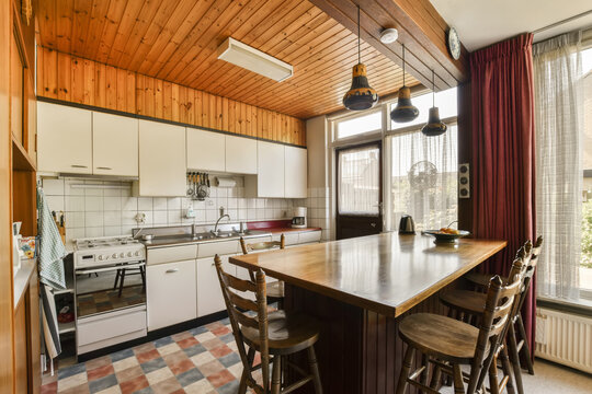 Kitchen and dining area of house with wood