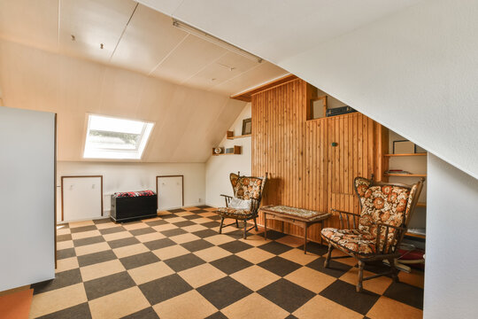 Room with tiled floor and chairs - Powered by Adobe
