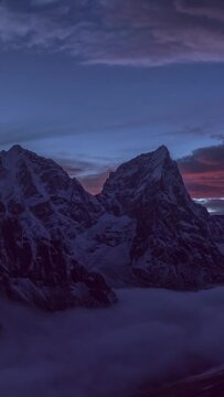 Taboche and Cholatse Mountains at Evening Twilight. Himalaya, Nepal. Timelapse. Vertical Video