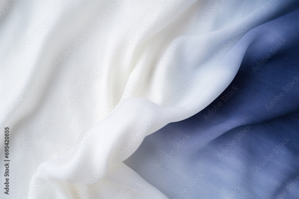 Poster a close up view of a white and blue fabric with a blurry image of the top part of the fabric and the
