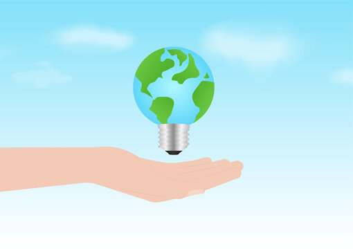 Hand Holding Earth Light Bulb. Save the World, Electricity and Energy. Green Energy or Renewable Energy. Eco- Friendly Concept. 