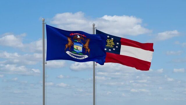 Georgia and Michigan US state flags waving together on cloudy sky, endless seamless loop