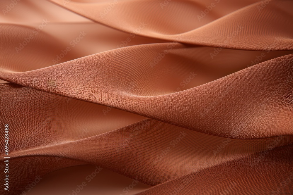 Poster a close up of a brown fabric with a wavy design on the top of the fabric and bottom of the fabric on