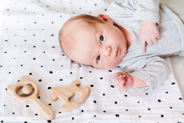 Portrait of 2 weeks old baby. Newborn baby at first months of life.