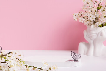 Empty podium or pedestal with spring bloom. Spring mock up for cosmetic products