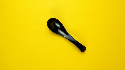 Black spoon - obrazy, fototapety, plakaty