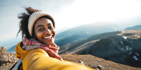 African hiker woman taking selfie portrait on the top of mountain, Happy woman smiling at camera, Tourism, sport life style and social media influencer