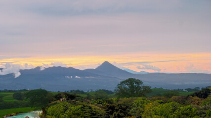 Fototapeta premium Arenal Volcano, forest, rivers, cattle, imposing, impressive