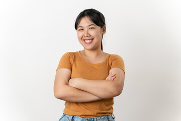 the pretty and happy Asian young woman is smiling confidently standing on a white background.