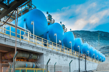 Water tanks and reverse osmosis equipment in a desalination plant.