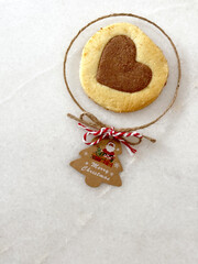 Fototapeta na wymiar Christmas cookie with love. Home bake cookies with chocolate and butter flavor. Unique lighting.