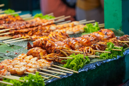 Seafood octopus and other meat balls on a street food stall.
