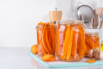 Homemade pickled carrots, Fermented carrot, salted conserved preserved vegetables canned in glass...
