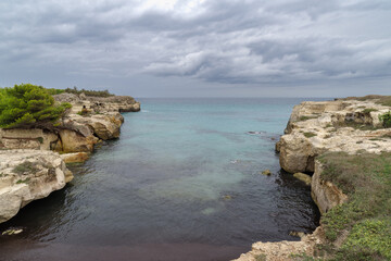 Grotta della Poesia coast cliff, Salento, Apulia, Italy