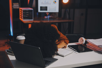 Asian woman overwork and sleep on the table after she feeling very try.Depression and...