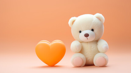 white teddy bear with peach pastel heart on soft background